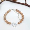 Sonnenstein Armband mit Herz-Erde Anhänger